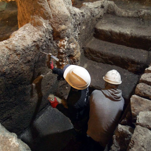 Excavating the Second Temple mikveh. Courtesy Emil Aladjam, IAA